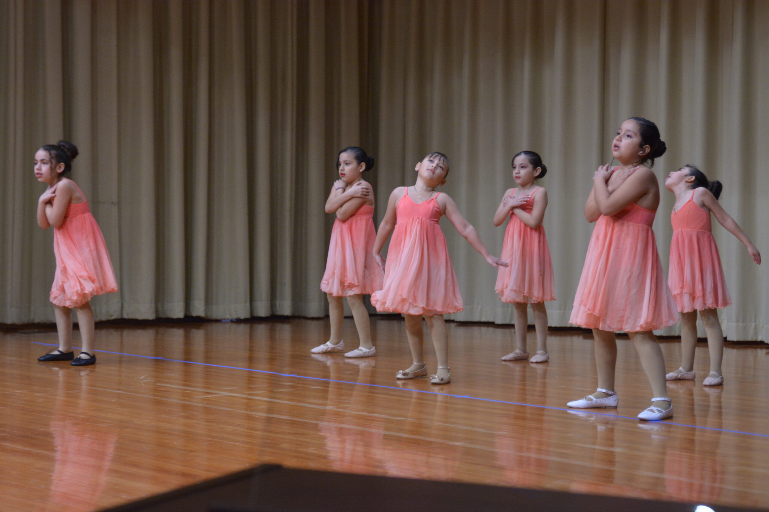 Group of kids dancing on stage